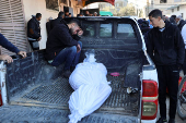 Funeral of Palestinians killed in Israeli strikes at Al-Aqsa Martyrs Hospital in Deir Al-Balah in the central Gaza Strip