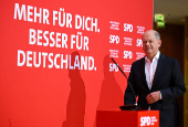 German Chancellor Olaf Scholz speaks to the media in a press statement, ahead of the annual kick-off meeting of the Social Democratic Party of Germany (SPD), in Berlin