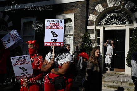 People demonstrate in support of Palestinians in Gaza, in London