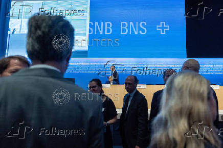 Shareholders arrive for the annual general meeting of the SNB in Bern