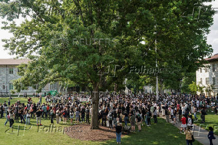 People demonstrate at Emory University near a student protest encampment in support of Palestinians, in Atlanta