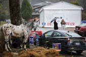 FILE PHOTO: The Wider Image - Behind the curtains: scenes from the US election