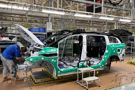 FILE PHOTO: JMEV electric vehicle production line in Nanchang