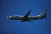 FILE PHOTO: A Boeing P-8 Poseidon aircraft from the U.S. Navy fly during an international aerial and naval military exhibition in Rota