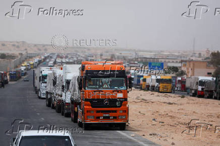Trucks stand at the Rafah border crossing between Egypt and the Gaza Strip