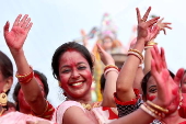 Immersion of idols on the last day of Durga Puja festival in India