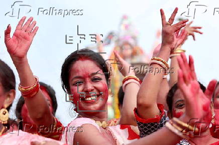 Immersion of idols on the last day of Durga Puja festival in India