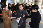 Seok Dong-hyeon, a lawyer for South Korea's impeached President Yoon Suk Yeol, arrives at a court, in Seoul