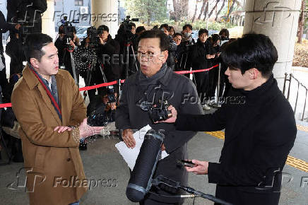 Seok Dong-hyeon, a lawyer for South Korea's impeached President Yoon Suk Yeol, arrives at a court, in Seoul