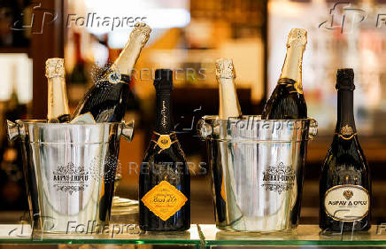 Bottles of Abrau-Durso sparkling wine are seen on display in a cafe in the GUM department store in Moscow