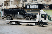 Palestinian security forces operate at the camp in Jenin