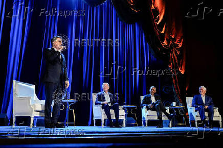 U.S. President Biden and former Presidents Obama and Clinton participate in a discussion at Radio City Music Hall in New York