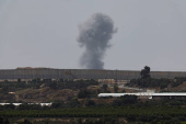 Smoke rises following an airstrike in Gaza
