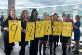 United Airlines flight attendants picket while negotiating a new labor agreement at O'Hare International Airport