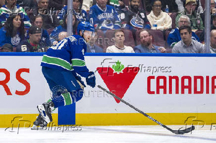 NHL: Calgary Flames at Vancouver Canucks