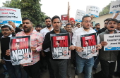 Student wing of the Indian National Congress protest against Indian industrialist Gautam Adani