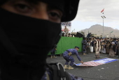 Houthi supporters protest againt the US and Israel in Sana'a