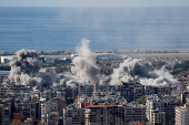 Smoke billows in Beirut's southern suburbs, after an Israeli strike