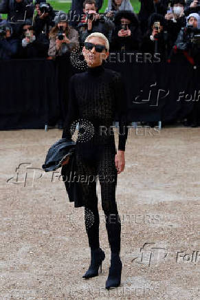 Guests arrive at Schiaparelli Haute Couture Spring/Summer 2025 show in Paris