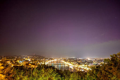 An aurora borealis is seen from Gellert Hill in Budapest