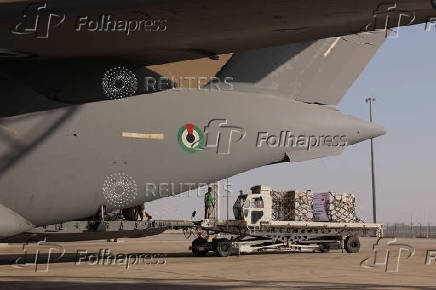 Aid for Lebanon is being loaded onto a cargo aircraft at the al-Reef Military Airport, in Abu Dhabi