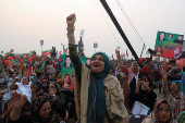 Supporters of jailed former Pakistani Prime Minister Imran Khan attend a rally in Swabi