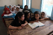 Afghan girls attend primary schools after summary holidays in Kandahar