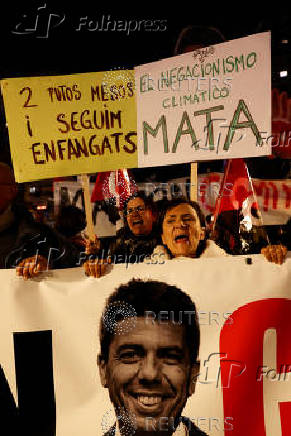 Protesters in Valencia call for regional leader Mazon to resign, in Valencia