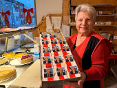 Ursula Trump presents pastries decorated with an eatable portrait of U.S. President-elect Donald Trump in a bakery in Freinsheim