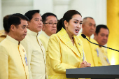 Thailand's Prime Minister Paetongtarn Shinawatra and her cabinet members attend a press conference in Bangkok