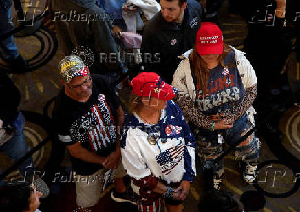 Supporters wait in line to see Tulsi Gabbard and Robert F. Kennedy Jr. take part in a moderated discussion with actor Zachary Levi in Dearborn