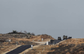 Israeli military vehicles operate in the Gaza Strip, amid the ongoing conflict between Israel and Hamas, as seen from southern Israel