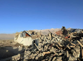 Damaged houses are pictured after an earthquake in Shigatse