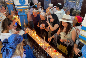FILE PHOTO: Jewish worshippers light candles at the Ghriba synagogue, during an annual pilgrimage in Djerba