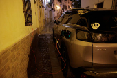 A Peugeot 3008 plug-in hybrid electric vehicle is seen parked in a street, in Ronda