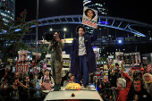 Supporters of Israeli hostages, kidnapped during the deadly October 7 2023 attack by Hamas, demand a deal as they protest amid ongoing negotiations for a ceasefire in Gaza, in Tel Aviv