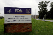 FILE PHOTO: Signage is seen outside of the Food and Drug Administration (FDA) headquarters in White Oak, Maryland, U.S.