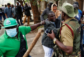 Kenyan activists and civil society representatives gather to deliver a list of people who disappeared during demonstrations against the government proposed tax hikes, in Nairobi