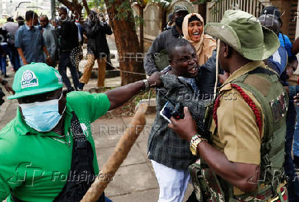 Kenyan activists and civil society representatives gather to deliver a list of people who disappeared during demonstrations against the government proposed tax hikes, in Nairobi