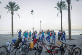 Women dance at the seafront in Beirut