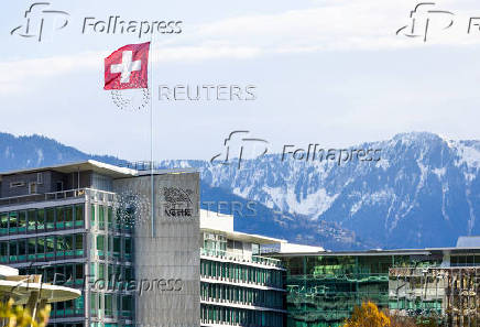 A Swiss flag flutters on the headquarters of Nestle in Vevey