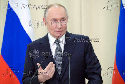 Russian President Putin attends a press conference in Leningrad region