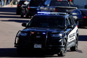 Investigators search a townhouse, in relation to the explosion in Las Vegas of a Tesla Cybertruck