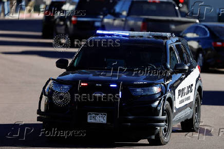 Investigators search a townhouse, in relation to the explosion in Las Vegas of a Tesla Cybertruck