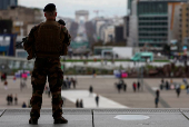 FILE PHOTO: Armed French soldier patrols at the esplanade of La Defense near Paris