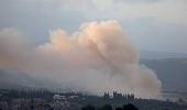 Smoke rises on the Lebanese side of the border with Israel, as seen from Tyre