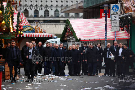 German Chancellor Scholz visits the site of Christmas market attack, in Magdeburg