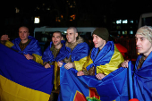 Ukrainian prisoners of war (POWs) return after a swap, in an undisclosed location