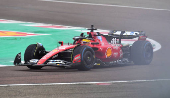 Lewis Hamilton drives a Ferrari F1 car around the Fiorano circuit as part of the TPC tests.