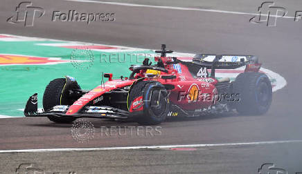 Lewis Hamilton drives a Ferrari F1 car around the Fiorano circuit as part of the TPC tests.